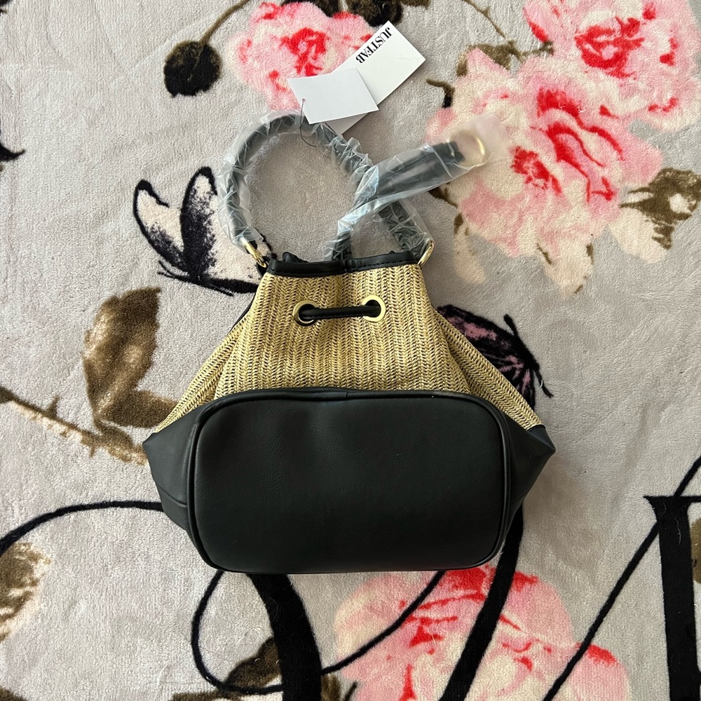 Elegant Black and Tan Shoulder Bag with Structured Design